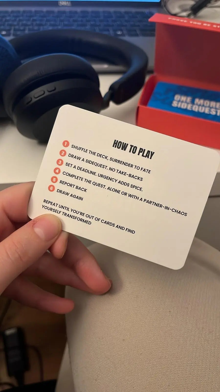 Learning how to play One More Sidequest with the instruction card