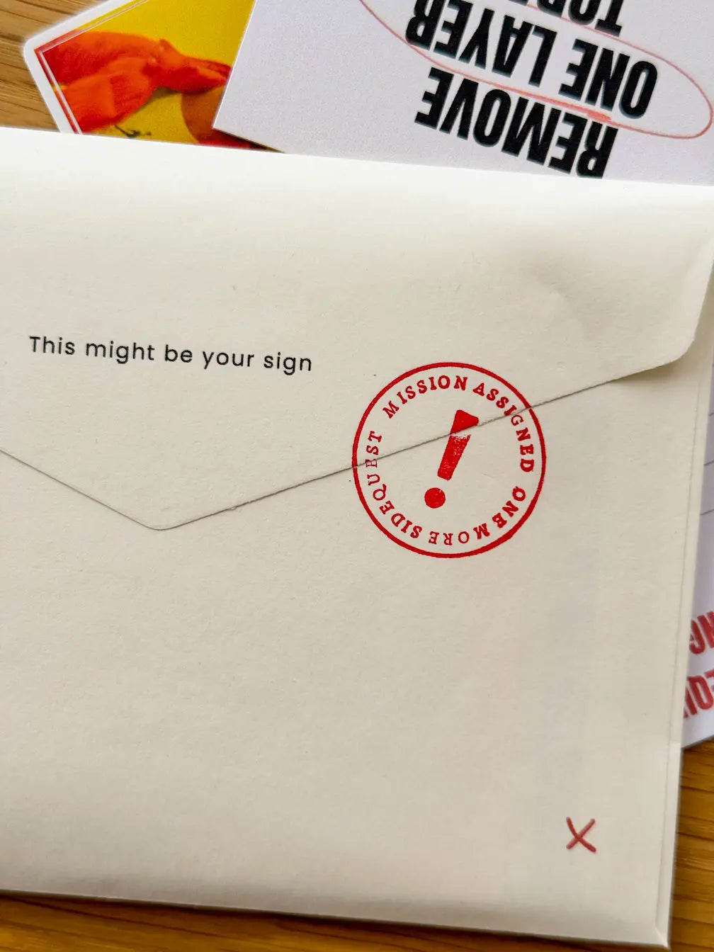 Sidequest Mail Club envelope with a monthly real-life adventure letter and a sidequest  to complete