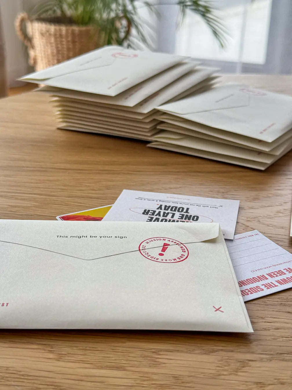 Stack of Sidequest Mail Club envelopes ready to deliver monthly adventures