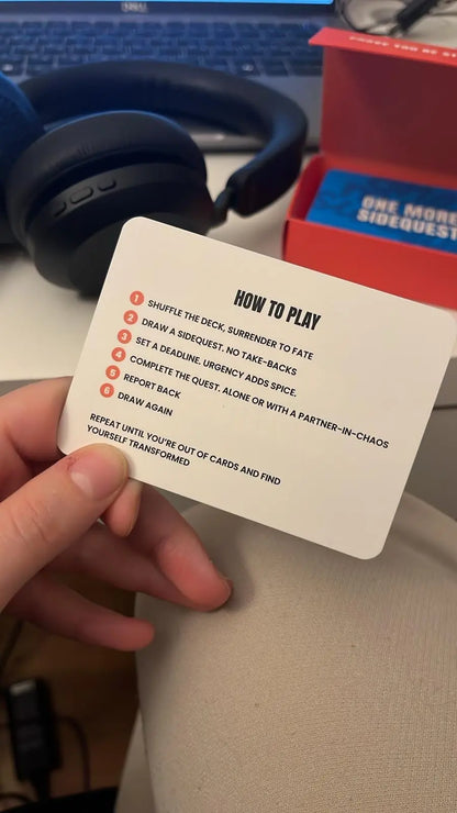 Learning how to play One More Sidequest with the instruction card